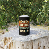 Dad Mode stubby cooler on a tree stump, colorful drinkware perfect for Father's Day gifts.
