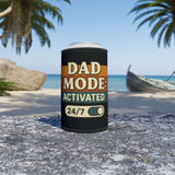 Dad Mode Stubby Cooler in tropical setting, perfect Father's Day gift for keeping drinks cold.