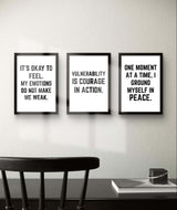 Three framed motivational quotes for wall decor promoting confidence and emotional strength in a modern setting.