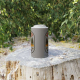 Adventure Partner Stubby Cooler on a log in a lush outdoor setting, ideal for summer gatherings.