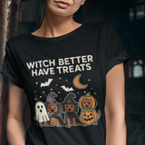 Woman wearing a black t-shirt with Halloween-themed design and text.