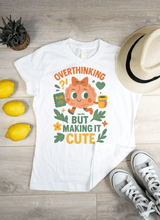 Overthinking But Make It Cute Tee – Funny Unisex Mental Health T-Shirt, Brain with Coffee & Planner