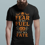 Man wearing a black t-shirt with 'Fear is my fuel, not my fate' text and graphics.