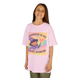 Girl wearing pink 'Kindness is My Magic Power' tee, promoting positivity and joy for kids.