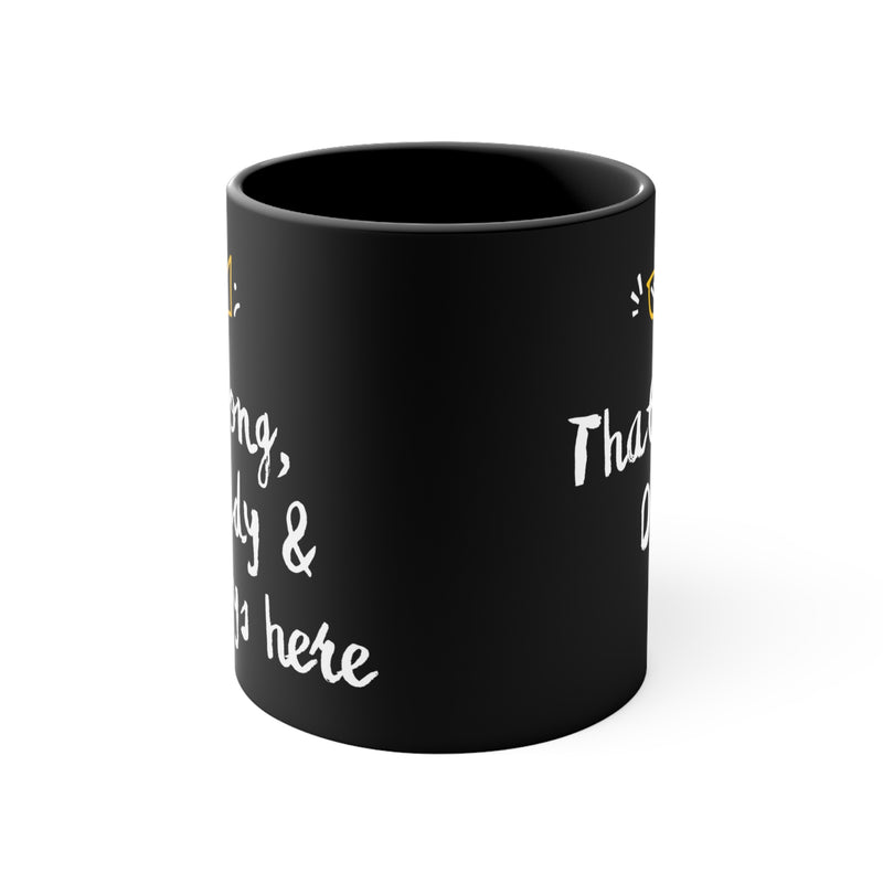 Black mug with white text on a white background