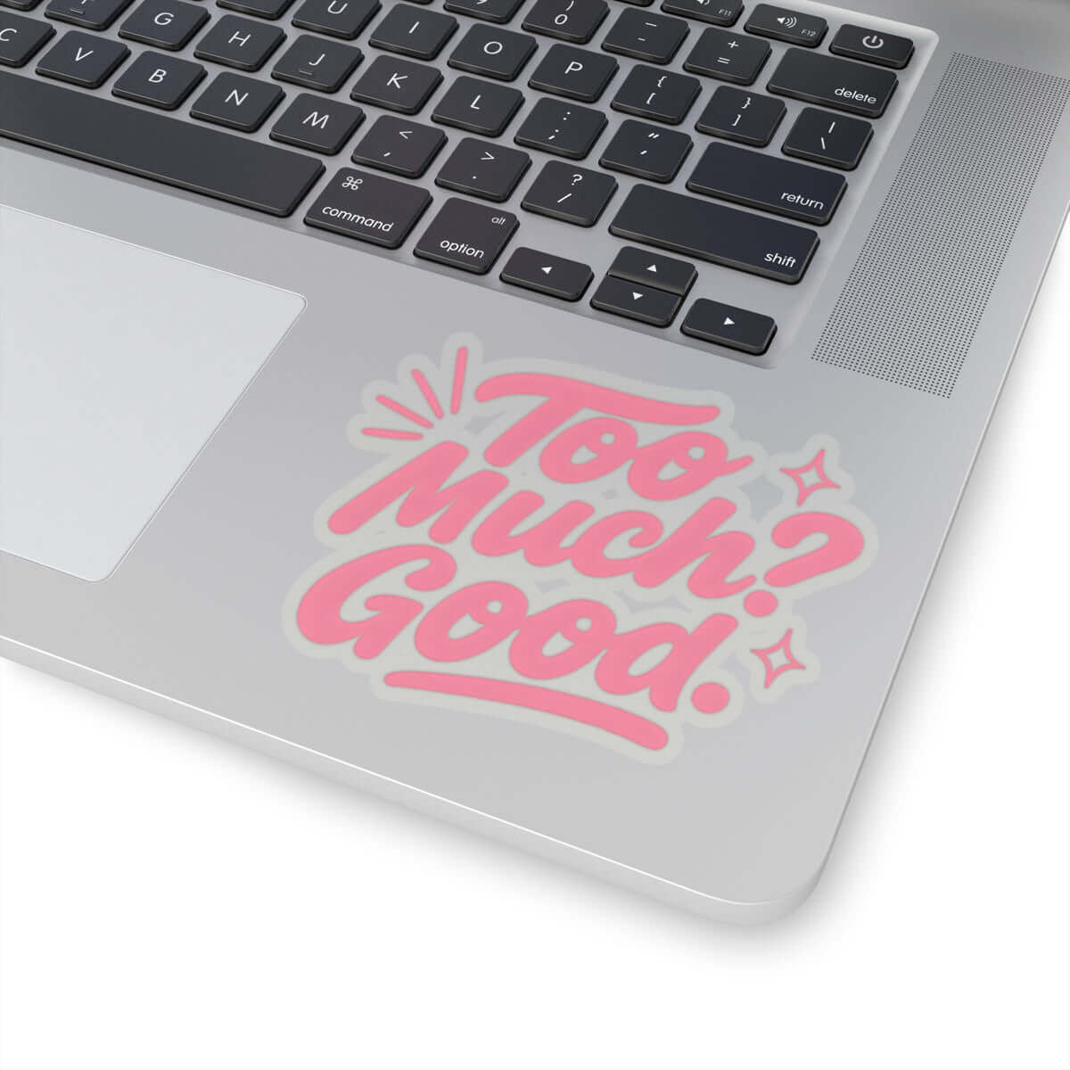 Kiss-Cut sticker on a laptop reading 'Too Much? Good.' in pink lettering, perfect for self-expression and decor.