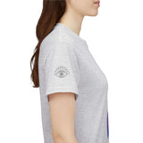 Profile view of a woman in a gray unisex t-shirt featuring an owl and the phrase 'My Intuition Never Lies'.