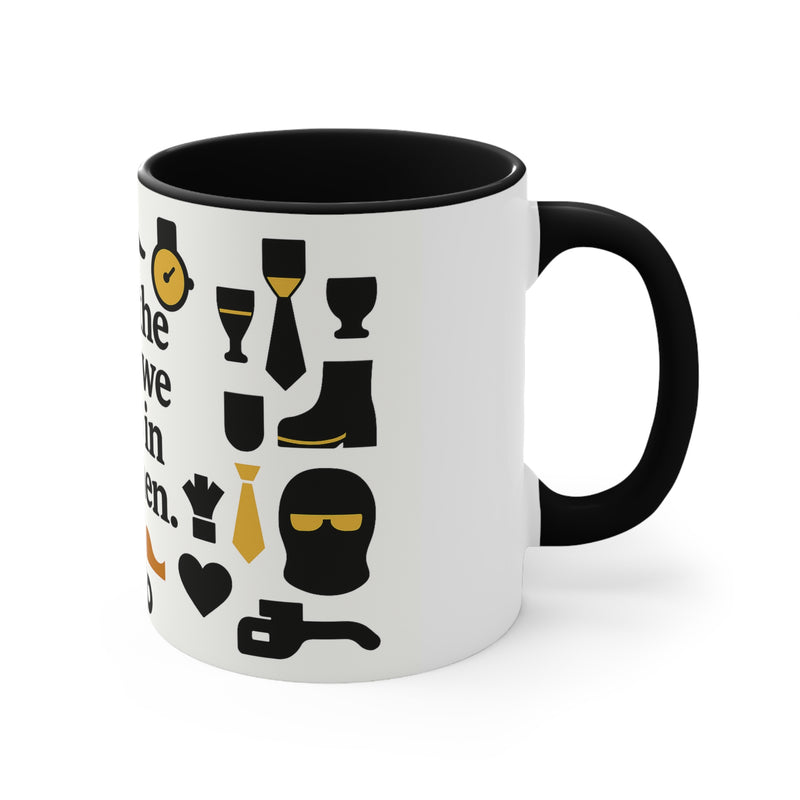 White mug with black interior and handle featuring various icons and text on a white background