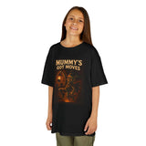 Kids Halloween t-shirt featuring 'Mummy's Got Moves' design on a black background, perfect for playful outfits.