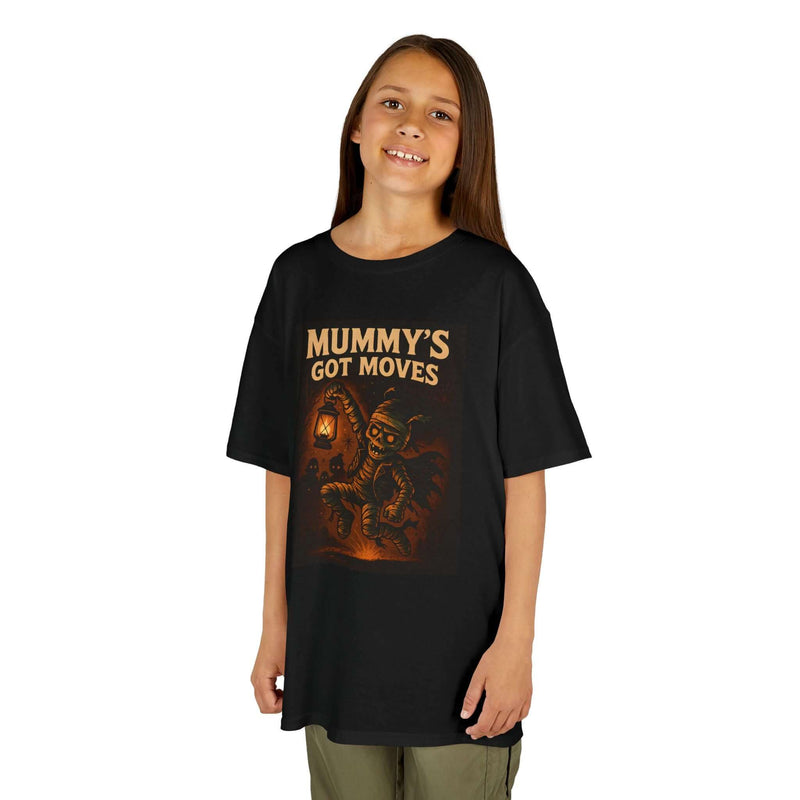 Kids Halloween t-shirt featuring 'Mummy's Got Moves' design on a black background, perfect for playful outfits.