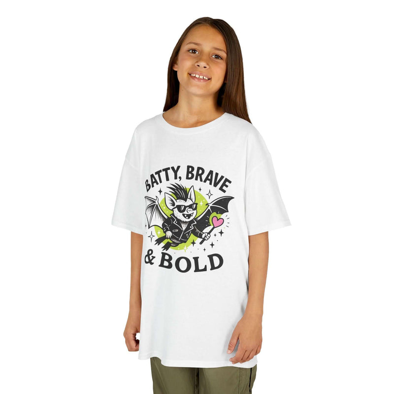 Girl wearing Kids Batty Brave & Bold Tee, fun graphic t-shirt perfect for Halloween and everyday adventures.