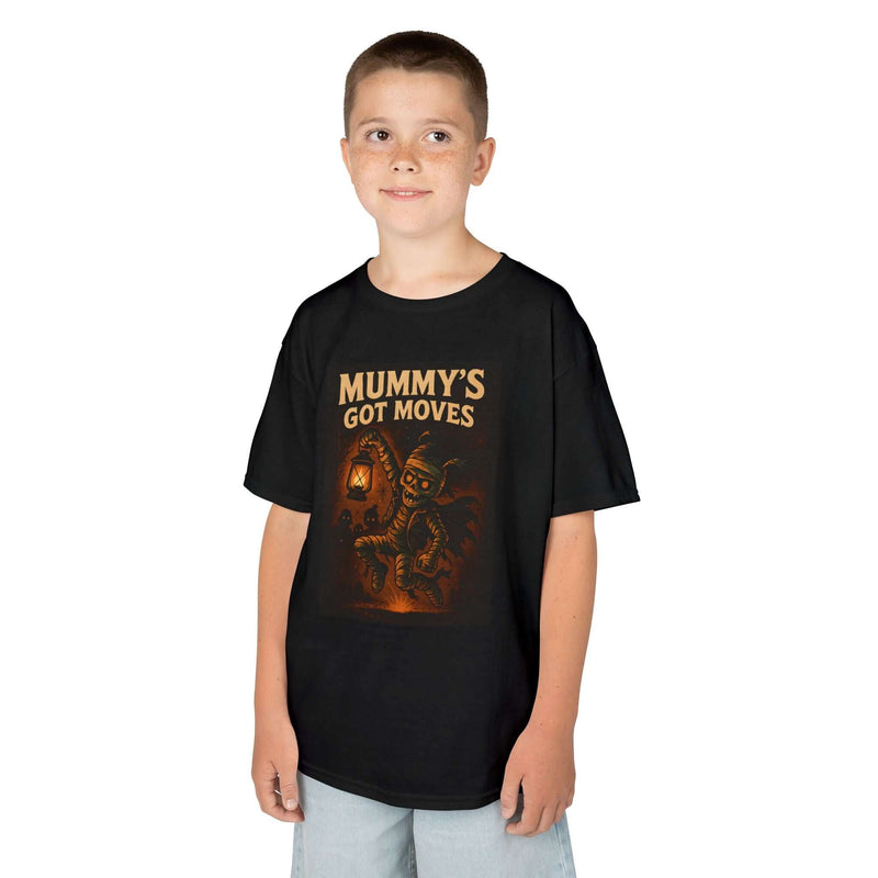 Child wearing black 'Mummy's Got Moves' Halloween T-shirt, showcasing fun design and comfortable fit.