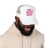 Man wearing a Too Much Good Trucker Hat with embroidered fun design, perfect for summer outings.