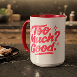 Colorful coffee mug with red handle and playful text "Too Much? Good!" perfect for home decor and gifts.
