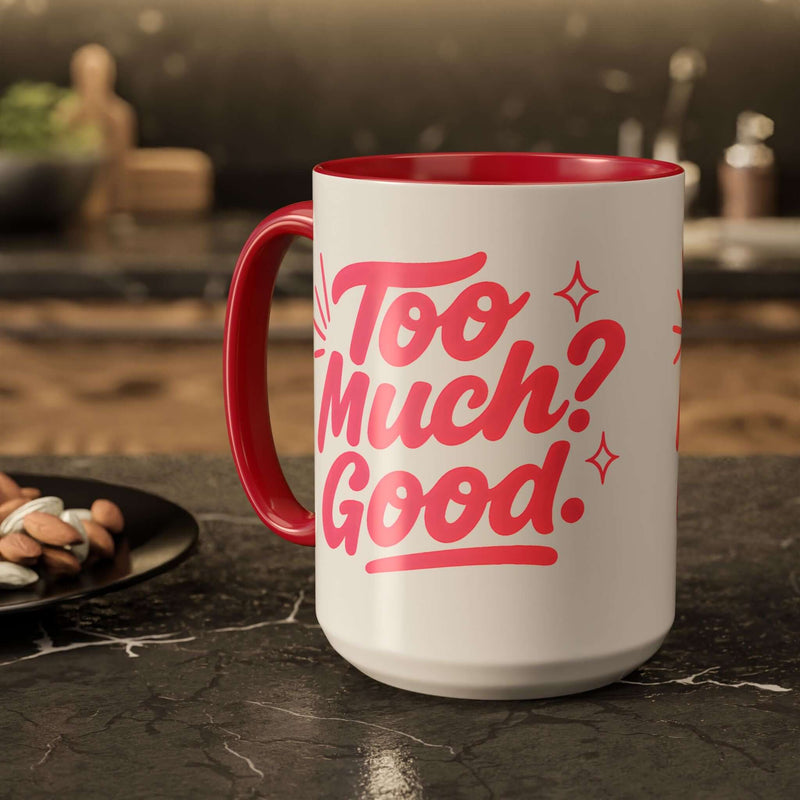 Colorful coffee mug with red handle and playful text "Too Much? Good!" perfect for home decor and gifts.