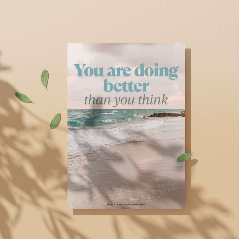 Inspirational quote print: "You are doing better than you think" with beach background and leaves.