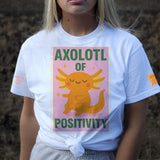Person wearing a white t-shirt with an axolotl graphic and text outdoors.