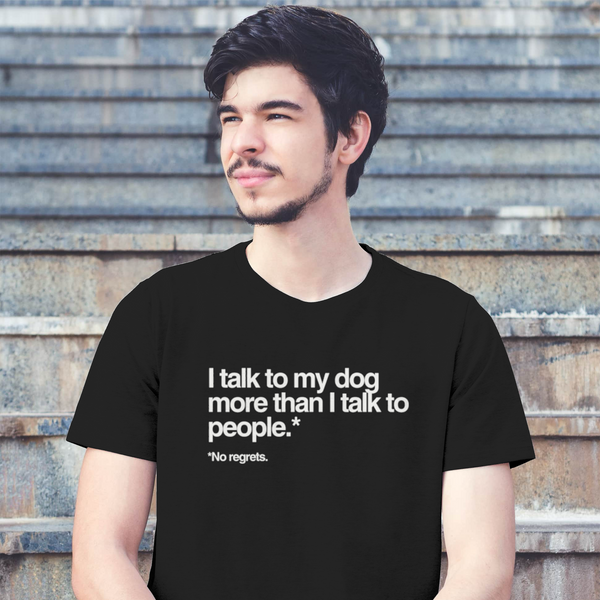Person wearing a black t-shirt with text sitting on steps
