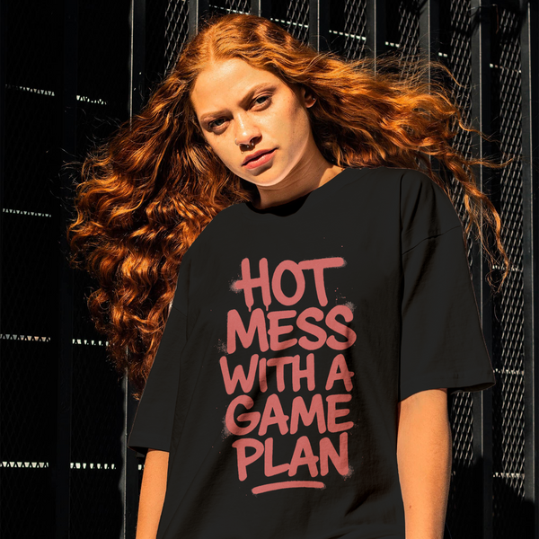 Person wearing a black t-shirt with red text against a dark background