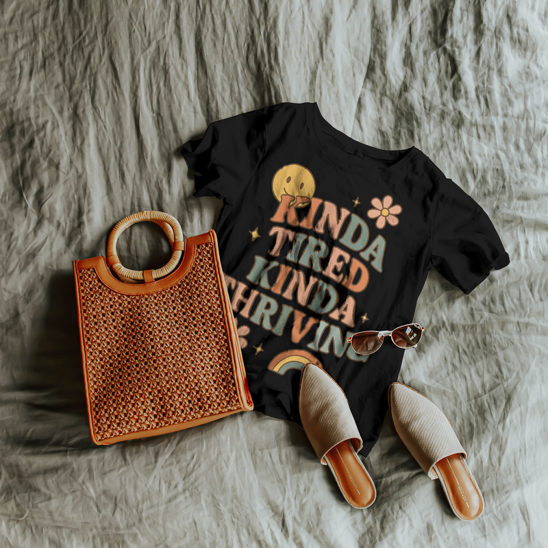 Unisex Retro Graphic Tee – ‘Kinda Tired Kinda Thriving’