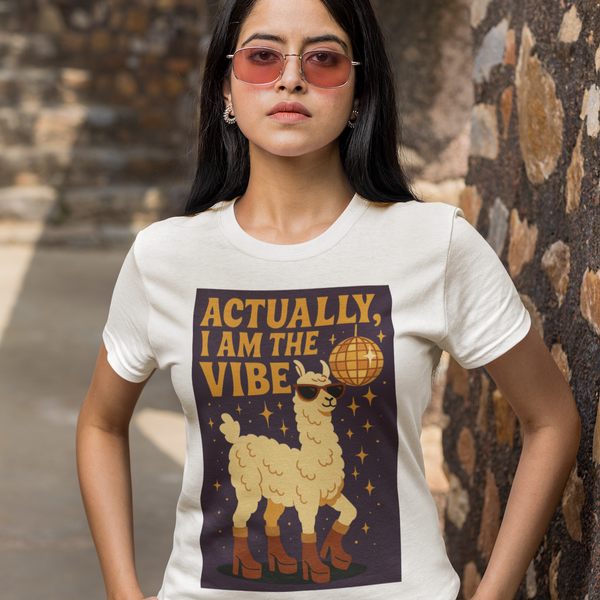 Woman wearing a t-shirt with a graphic design and text, standing outdoors.