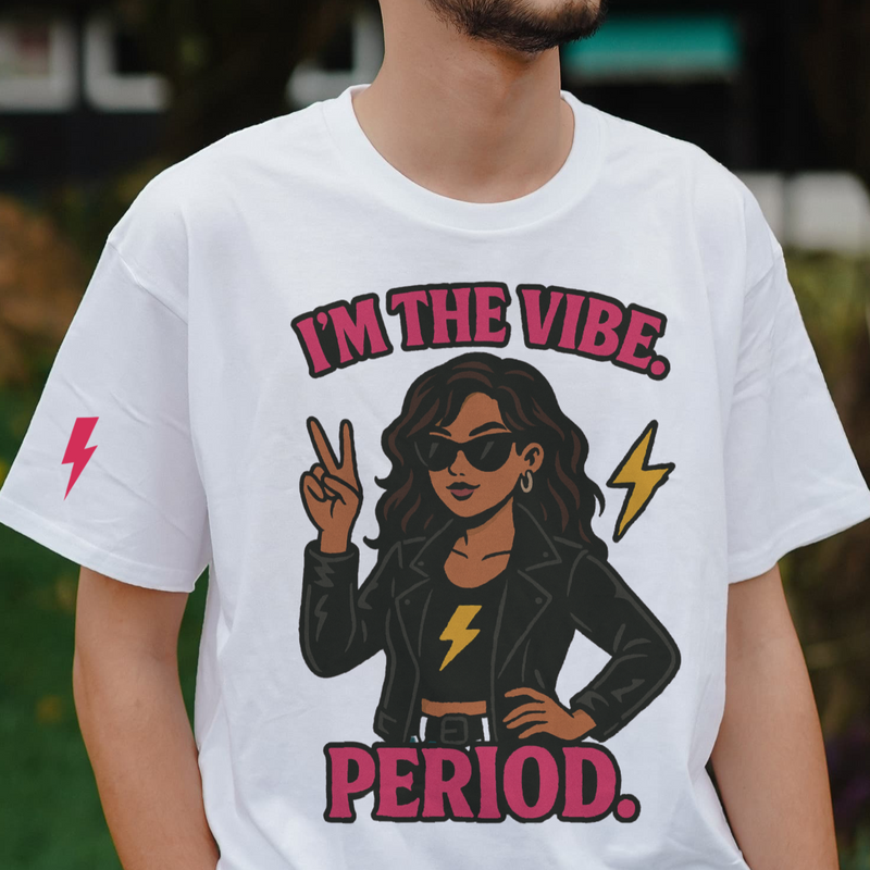 Man wearing a white t-shirt with a graphic design and text outdoors.