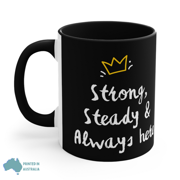 Black mug with white text and yellow crown on a white background